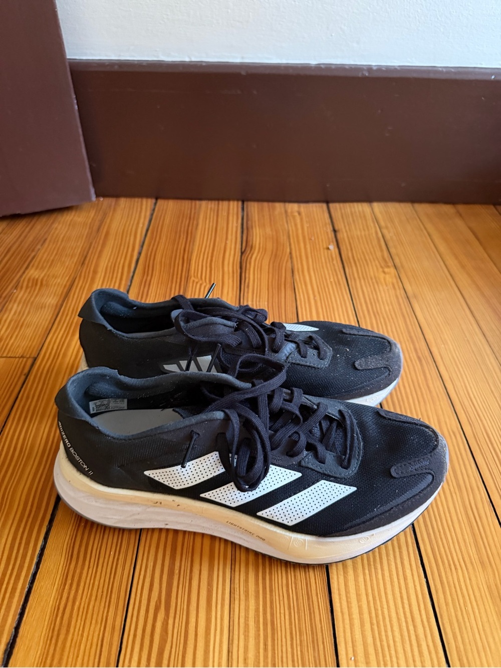 adidas Adizero Boston 11 Women’s Black and White Running Sneakers
